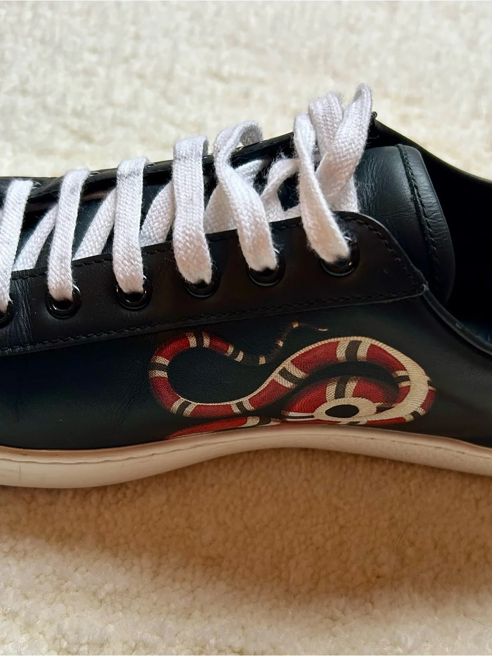 Men’s Gucci Black Leather Kingsnake sneakers